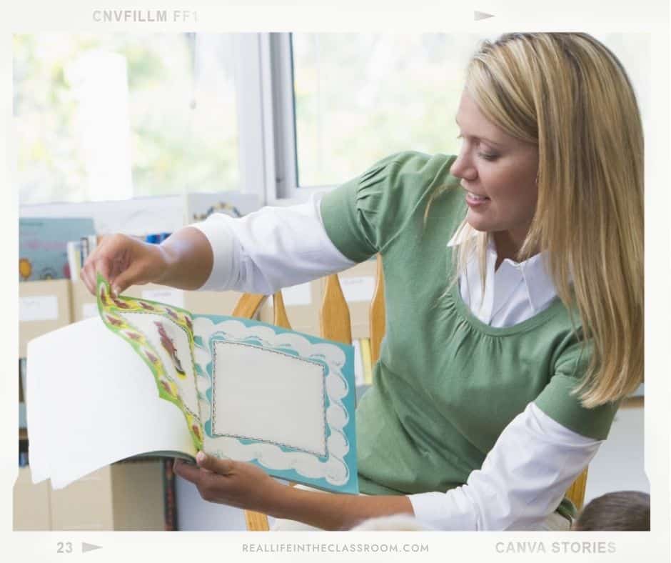 A teacher is holding a book she is reading