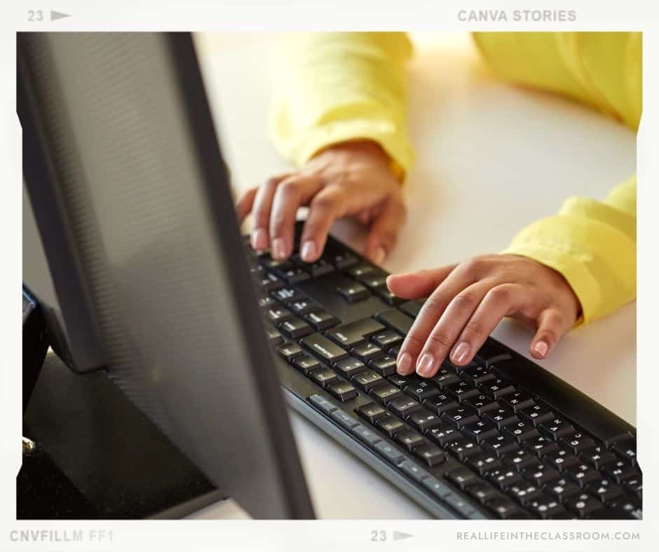 A teacher is typing a letter to parents on the computer to welcome back students