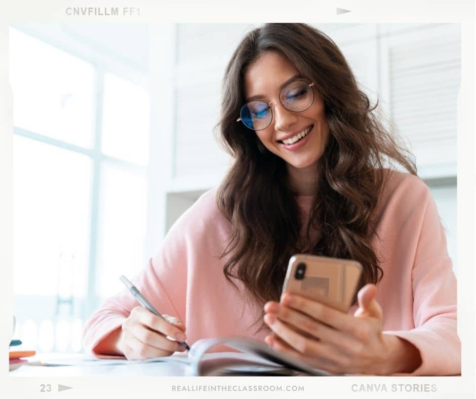 A teacher is looking at her phone and to-do list and trying to organize the list based on priority