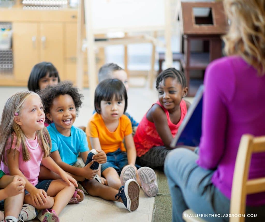 a teacher reading an Asian Pacific American Heritage book for elementary students to her class