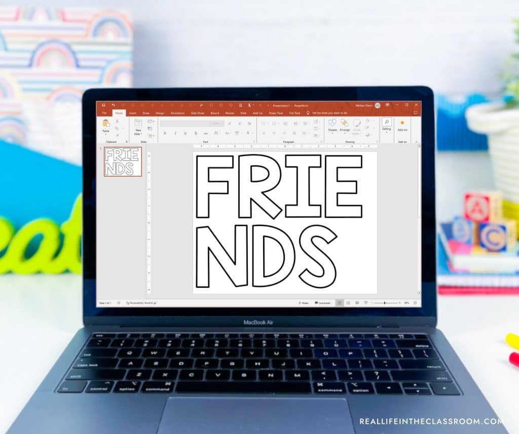 a laptop screen with MS PowerPoint open